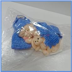 Фигурка шок. глазурь Малыш под голубым одеялом 8 см. 110 г.
